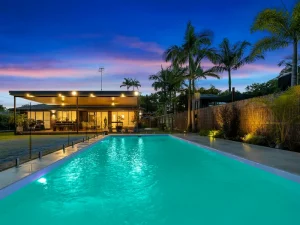 Home secured by Tewantin Buyers Agent Noosa with view from pool to home